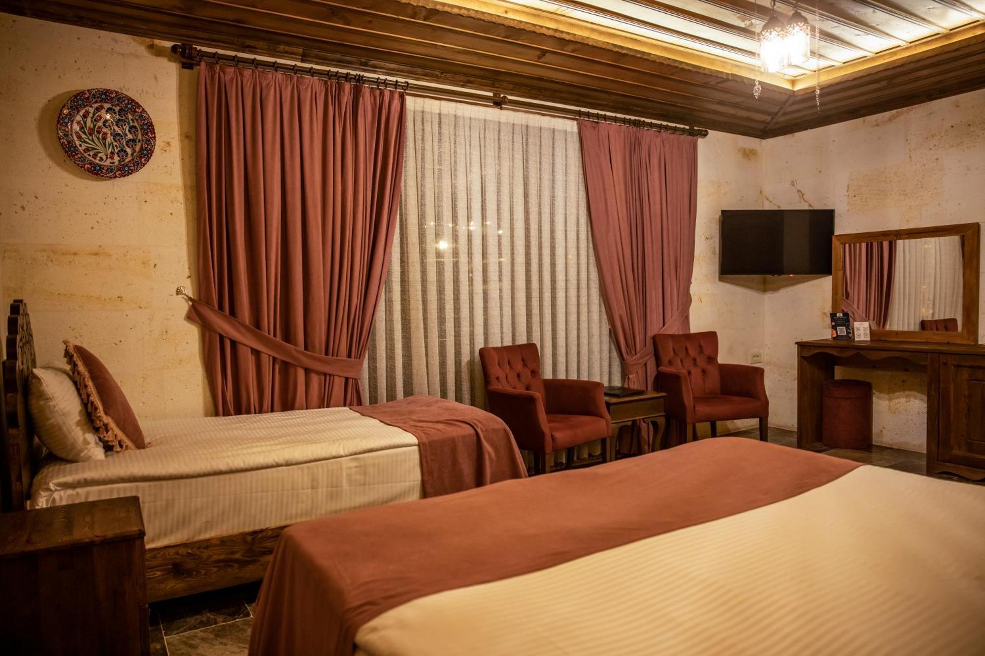 Garden Suites Hotel Cappadocia Goreme Quarto foto