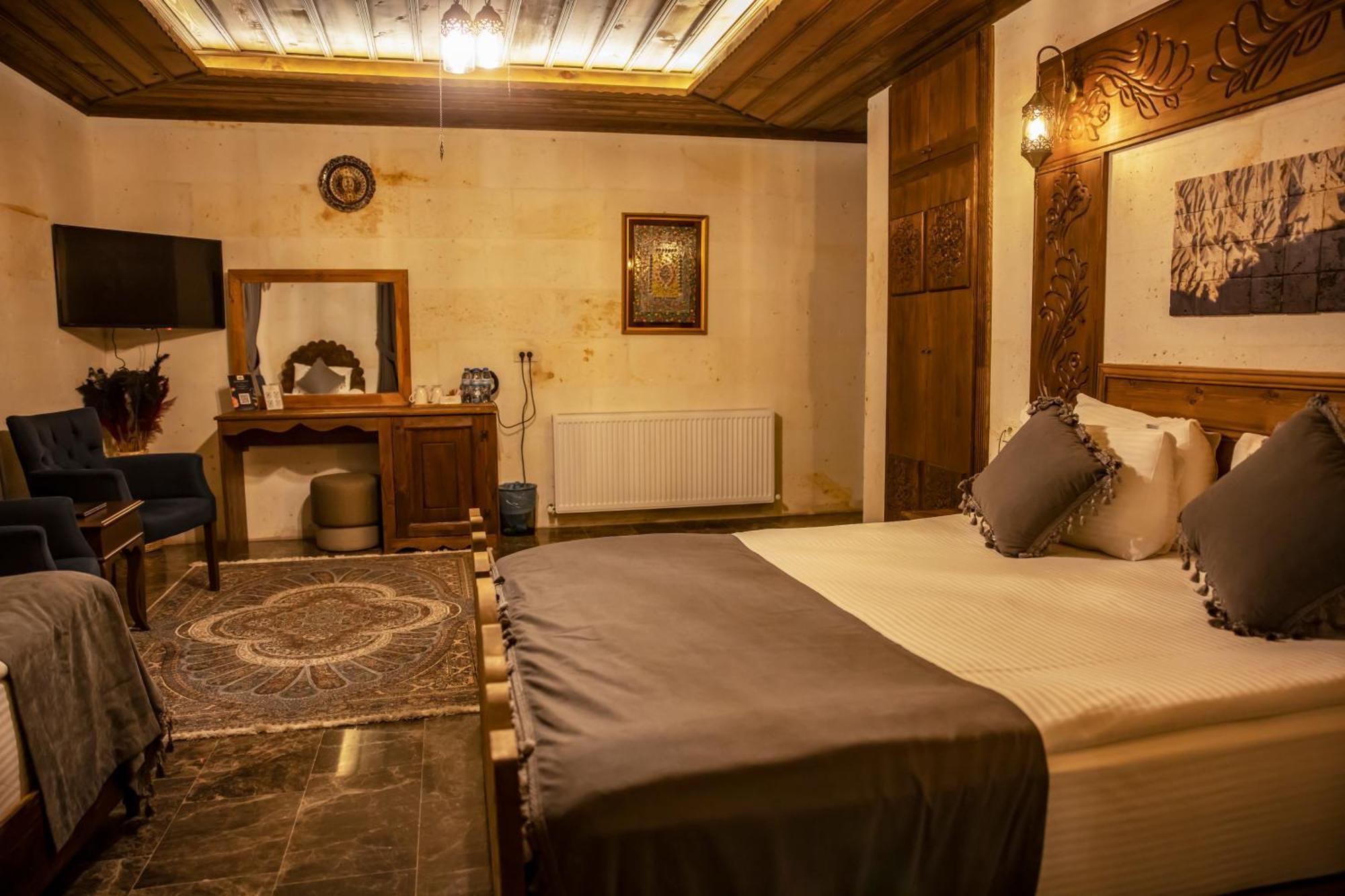 Garden Suites Hotel Cappadocia Goreme Quarto foto