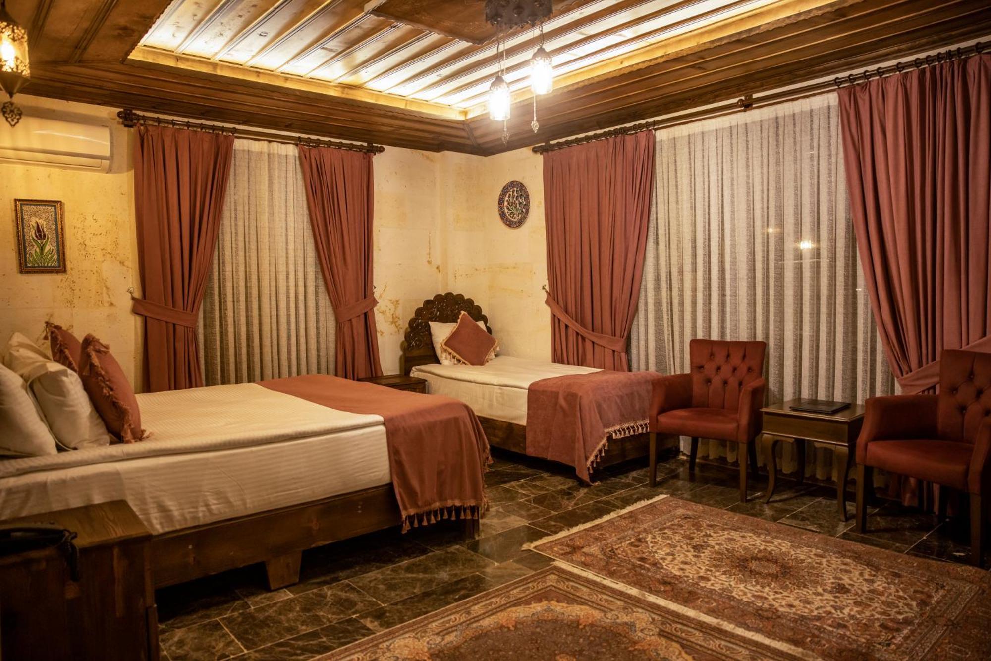 Garden Suites Hotel Cappadocia Goreme Quarto foto