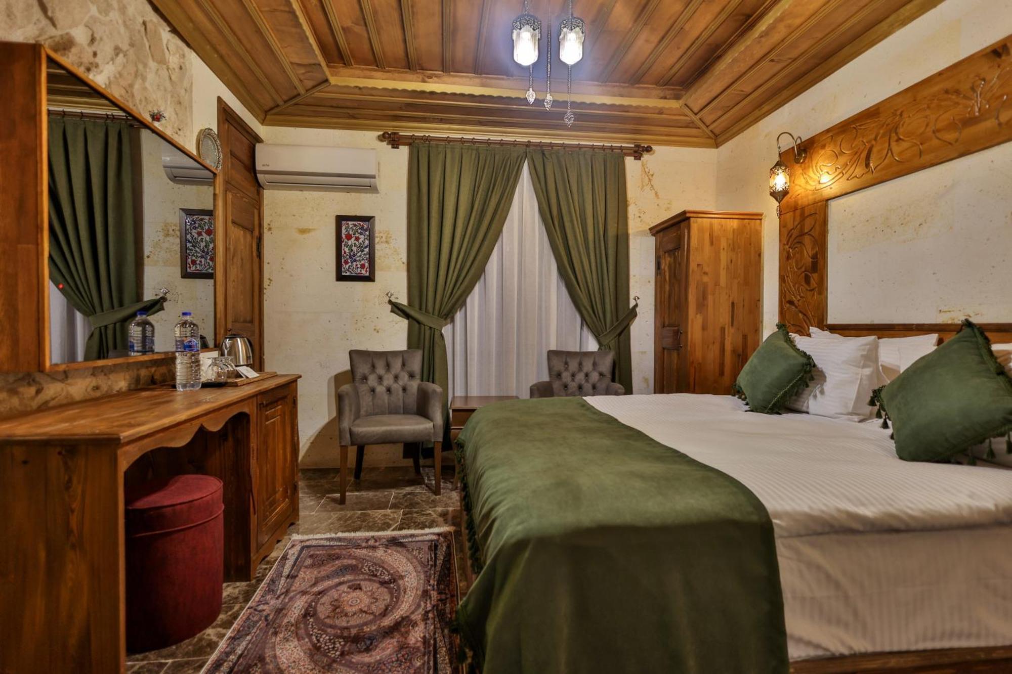 Garden Suites Hotel Cappadocia Goreme Quarto foto