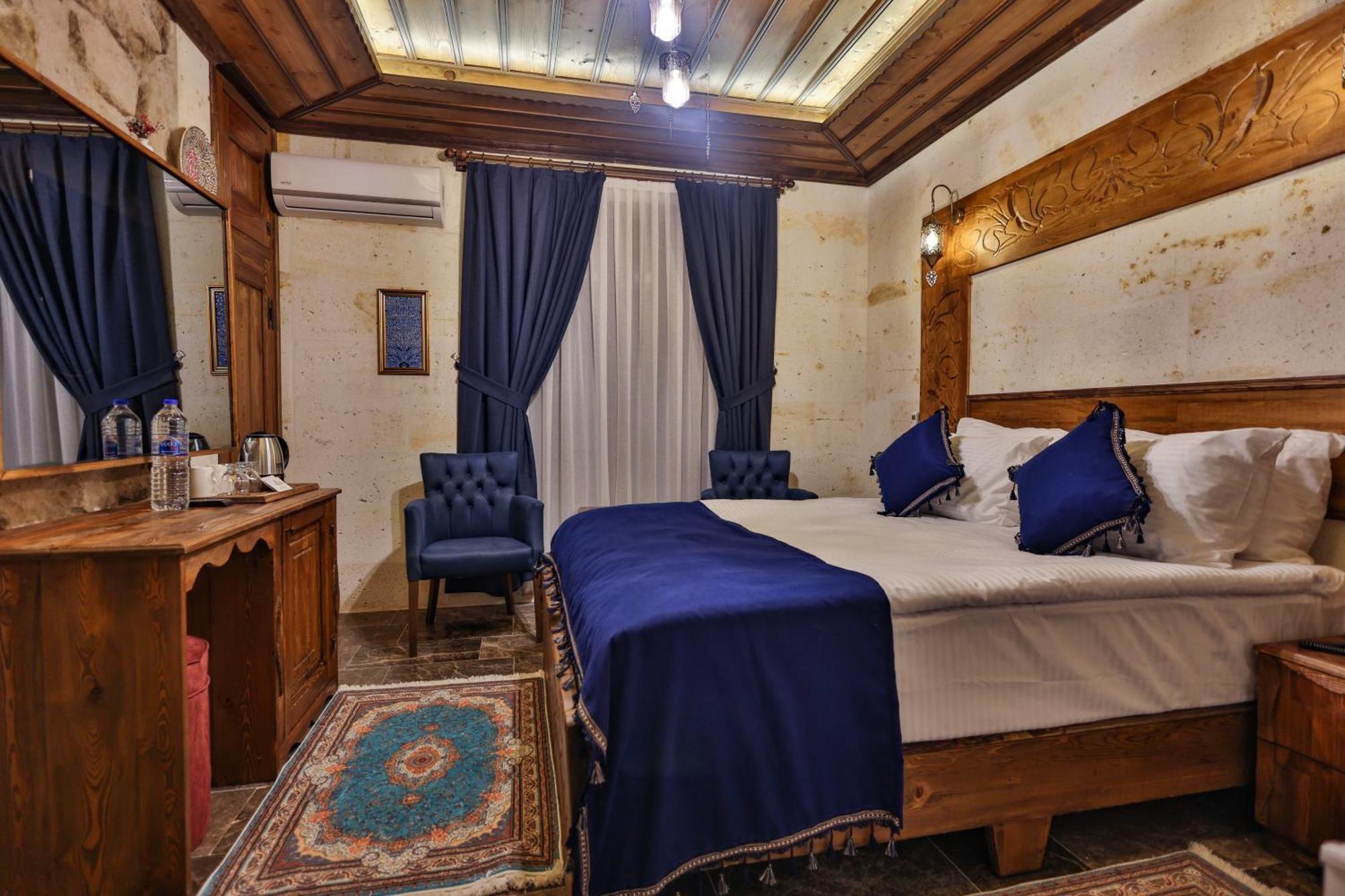 Garden Suites Hotel Cappadocia Goreme Quarto foto