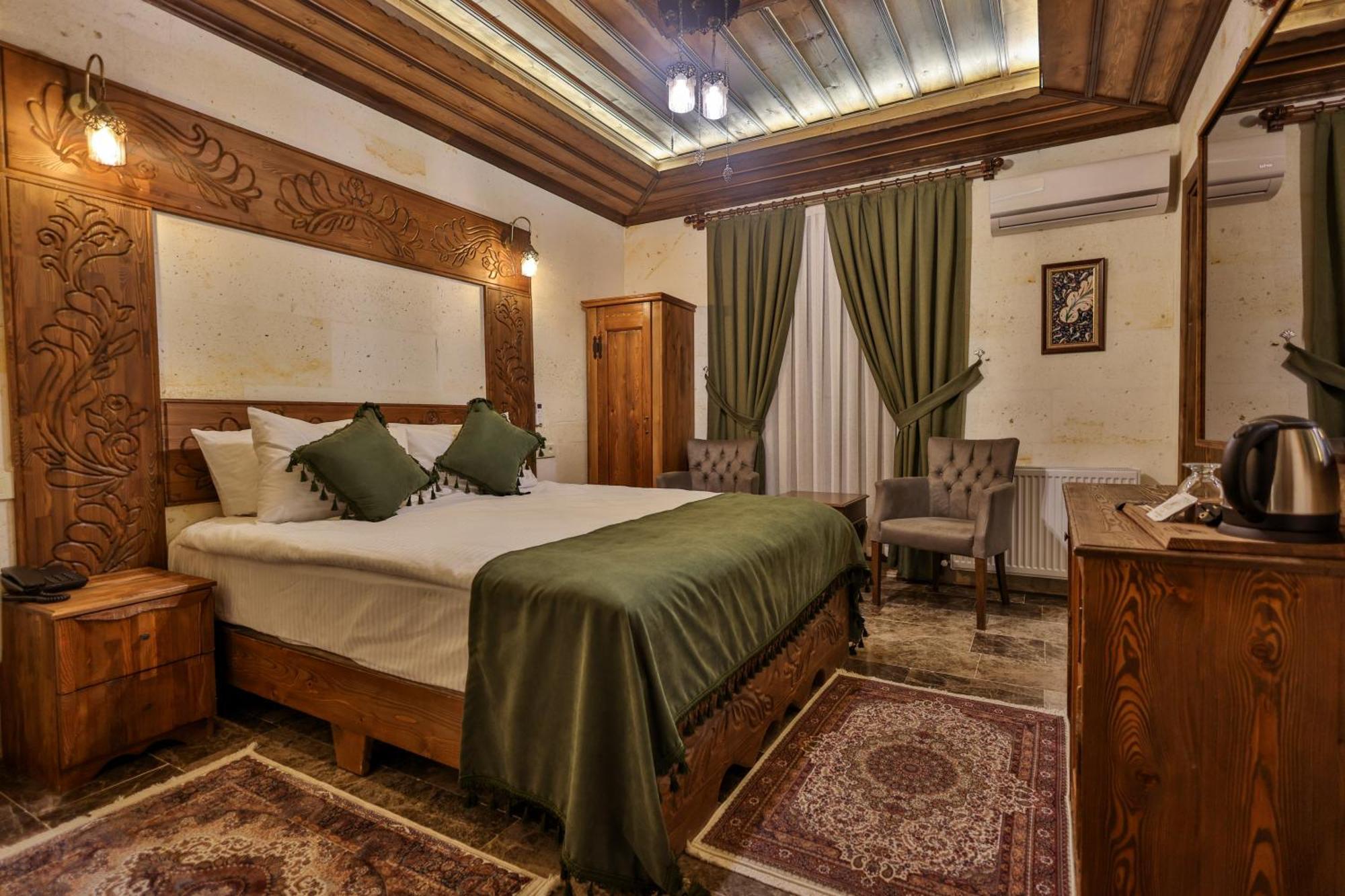 Garden Suites Hotel Cappadocia Goreme Quarto foto